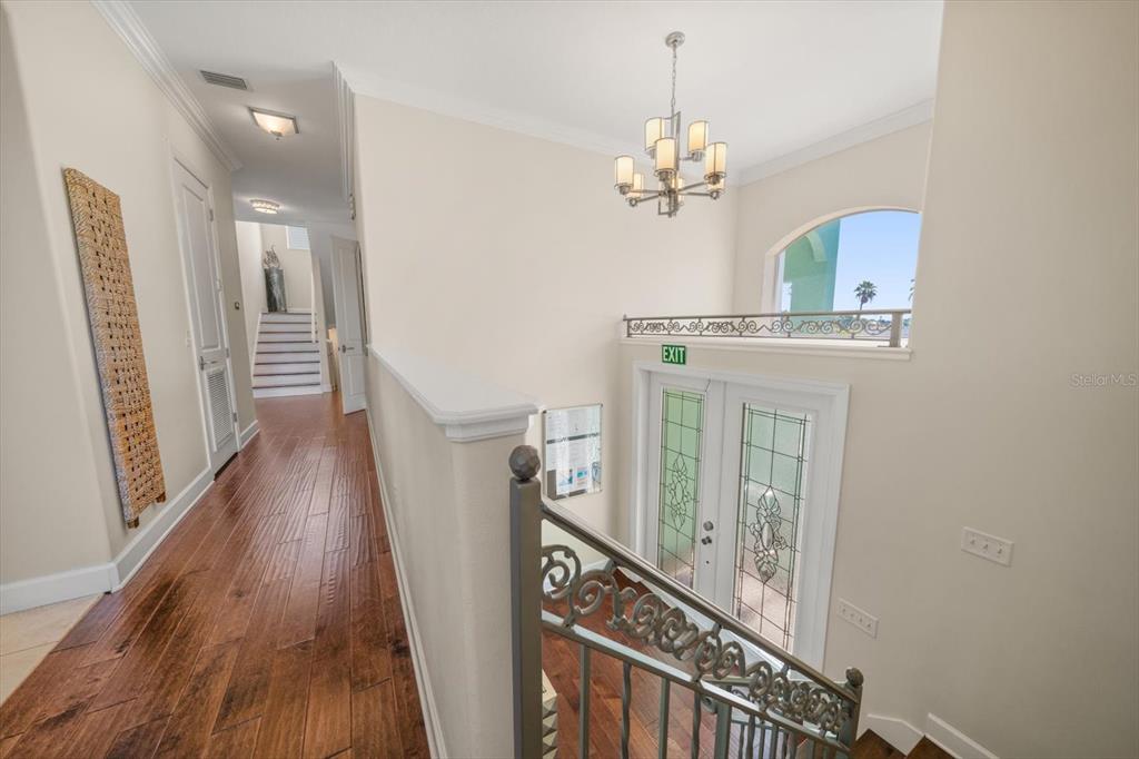 478 Harbor Drive South Indian Rocks Beach, FL 33785 - Photo 7 of 68 a view of a chandelier and wooden floor
