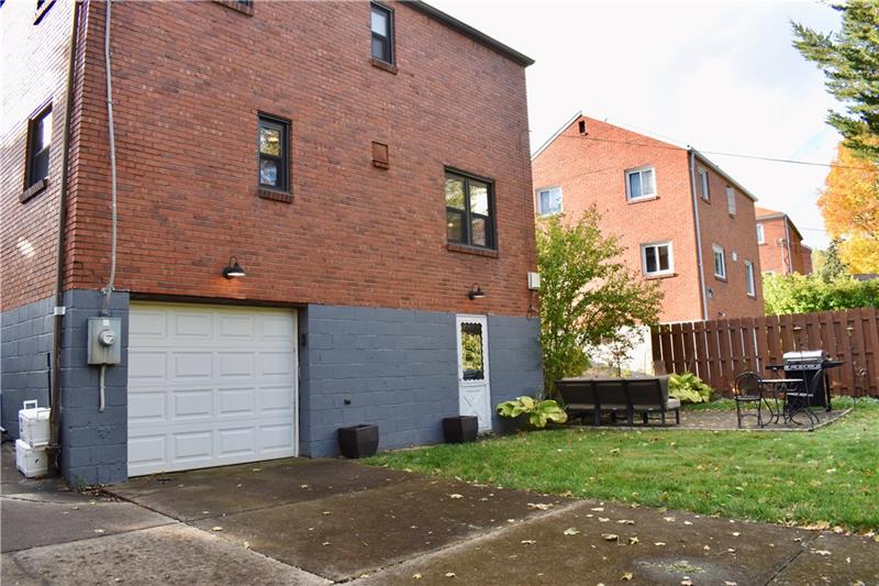 26 Robinhood Road Pittsburgh, PA 15220 - Photo 24 of 25 This home has a one car spacious garage, turn-around level concrete driveway and flat private back yard! A charming move-in ready home for you to enjoy with family and friends!