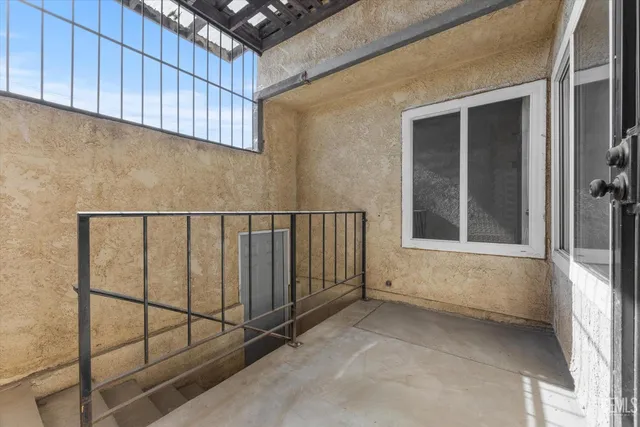 a view of a room with wooden walls