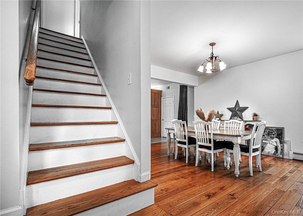 20 Rustic Hills Road Wurtsboro, NY 12790 - Photo 5 of 25 Dining area and stairs leading to the second floor