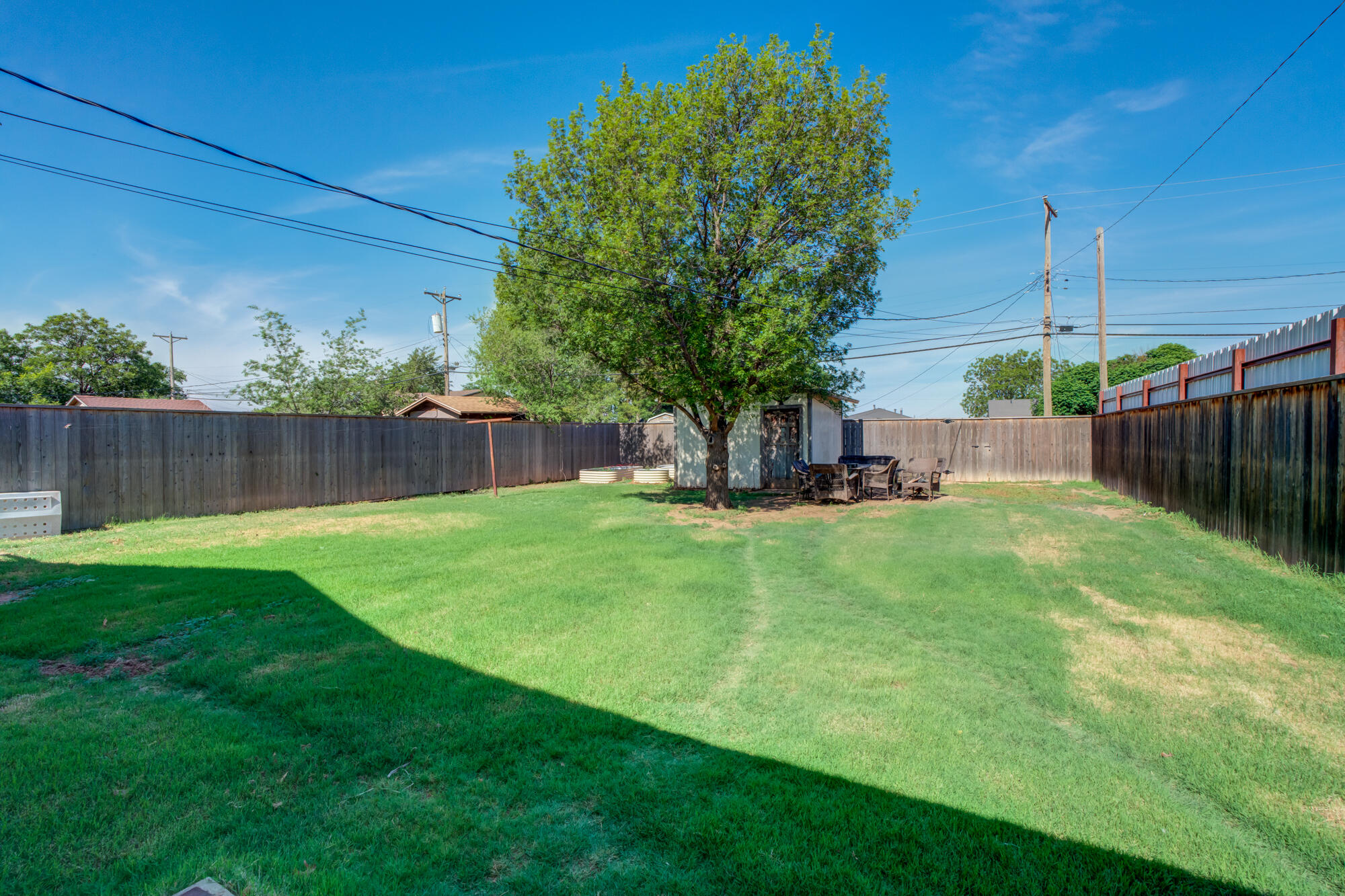 811 Borger Plainview, TX 79072 - Photo 5 of 32 811-Borger_Plainview-TX_30_Backyard