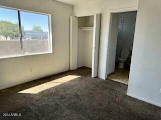 1002 North 27th Place Phoenix, AZ 85008 - Photo 49 of 57 an empty room with a window