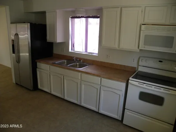 an empty room with a empty space and window