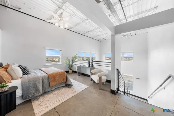 a view of entryway and kitchen