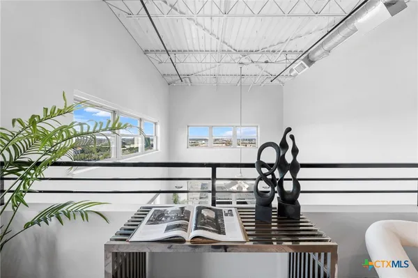 a bedroom with a bed and a walk in closet