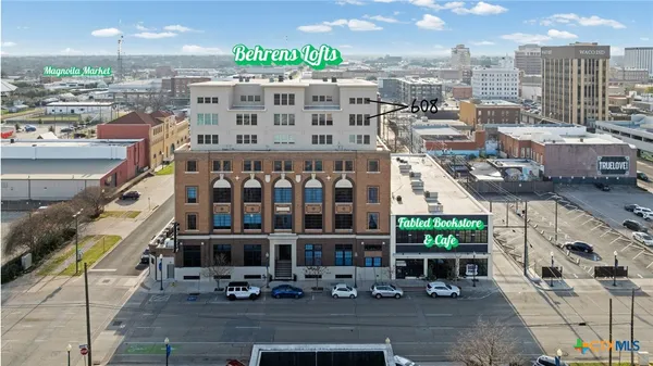 a view of a city with tall buildings