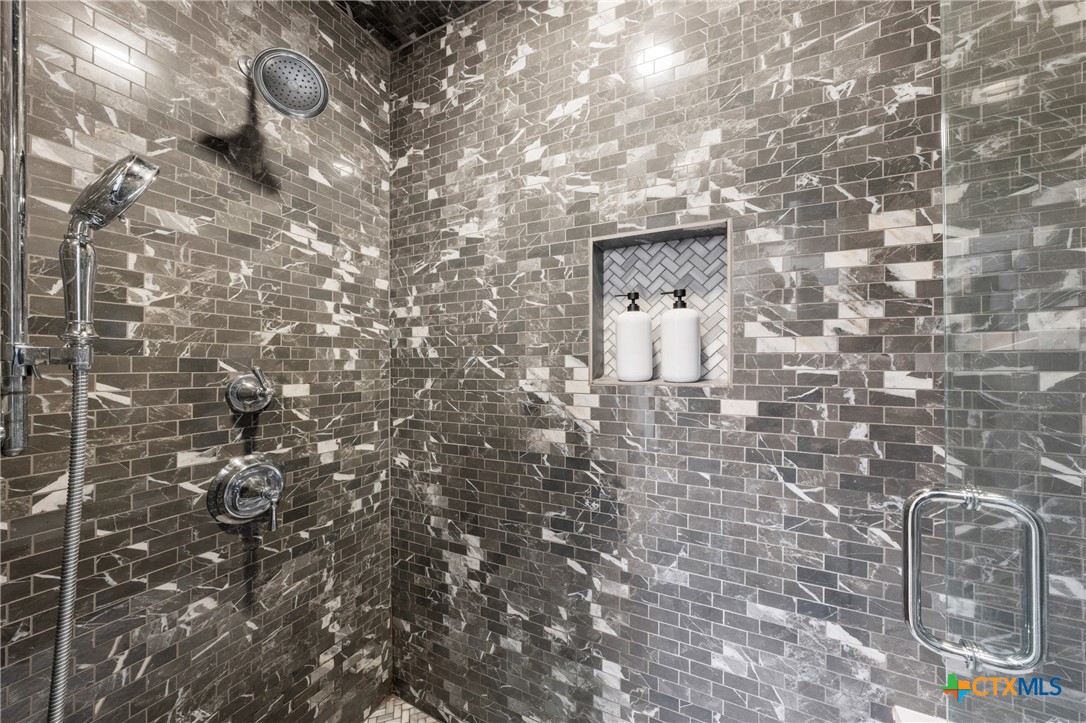 219 South 4th Street, Unit 608 Waco, TX 76701 - Photo 30 of 42 a bathroom with a shower
