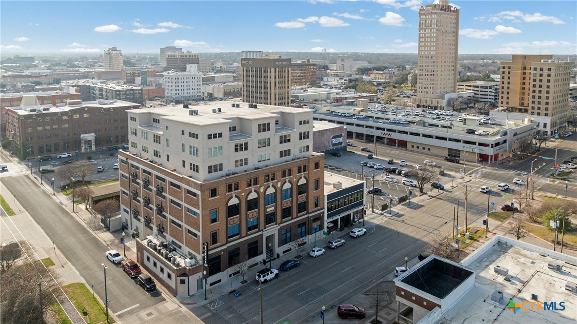 219 South 4th Street, Unit 608 Waco, TX 76701 - Photo 3 of 42 a view of a city with tall buildings