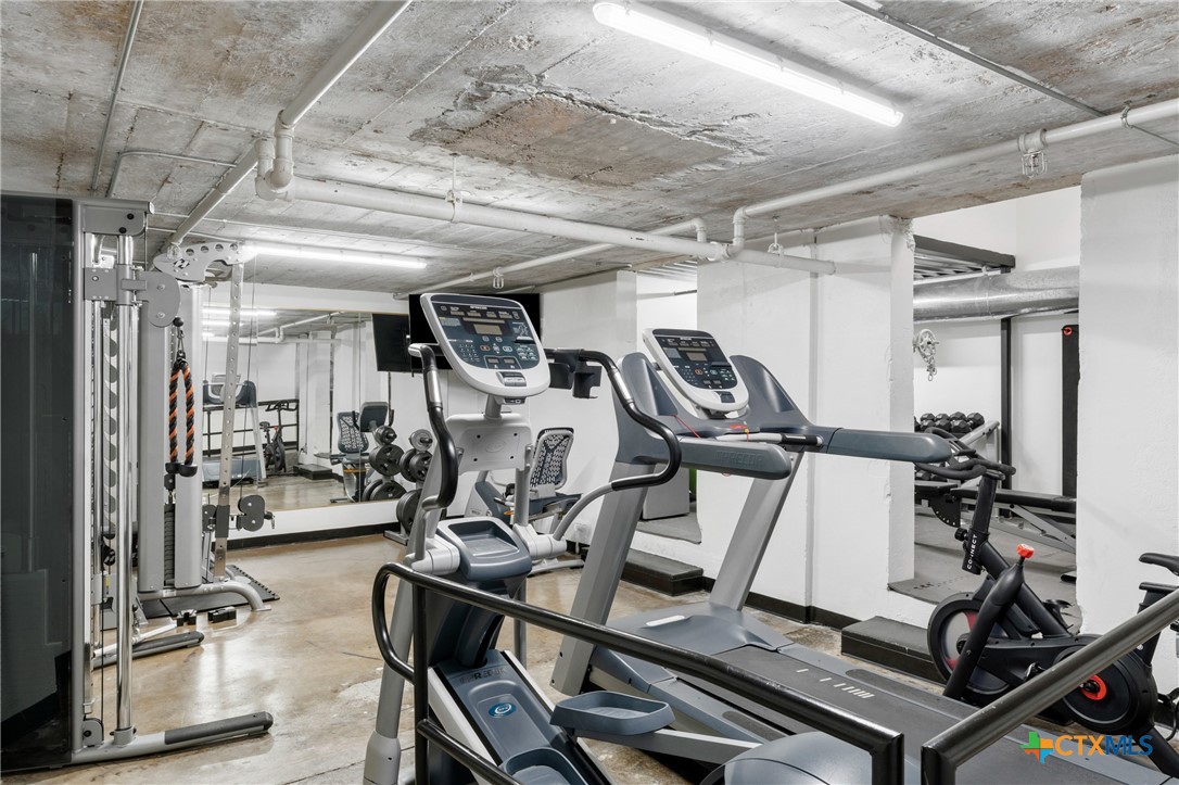 219 South 4th Street, Unit 608 Waco, TX 76701 - Photo 34 of 42 a view of a room with gym equipment