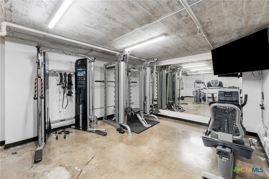 219 South 4th Street, Unit 608 Waco, TX 76701 - Photo 35 of 42 a view of a room with gym equipment