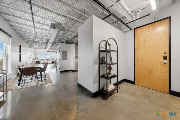 a kitchen with sink cabinets and window