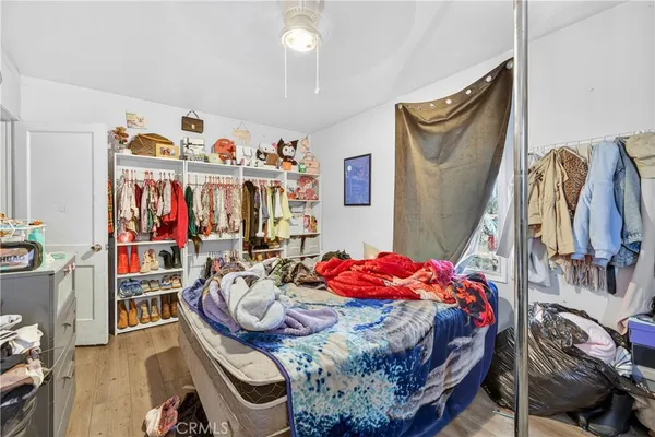 a bedroom with furniture and a bed