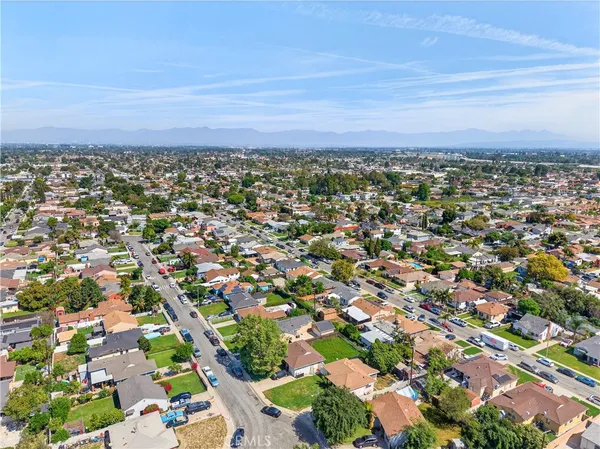 an aerial view of a city with lots of residential buildings
