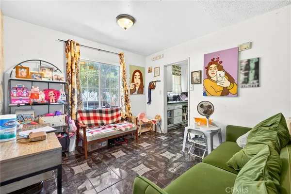 a bed room with furniture and a window