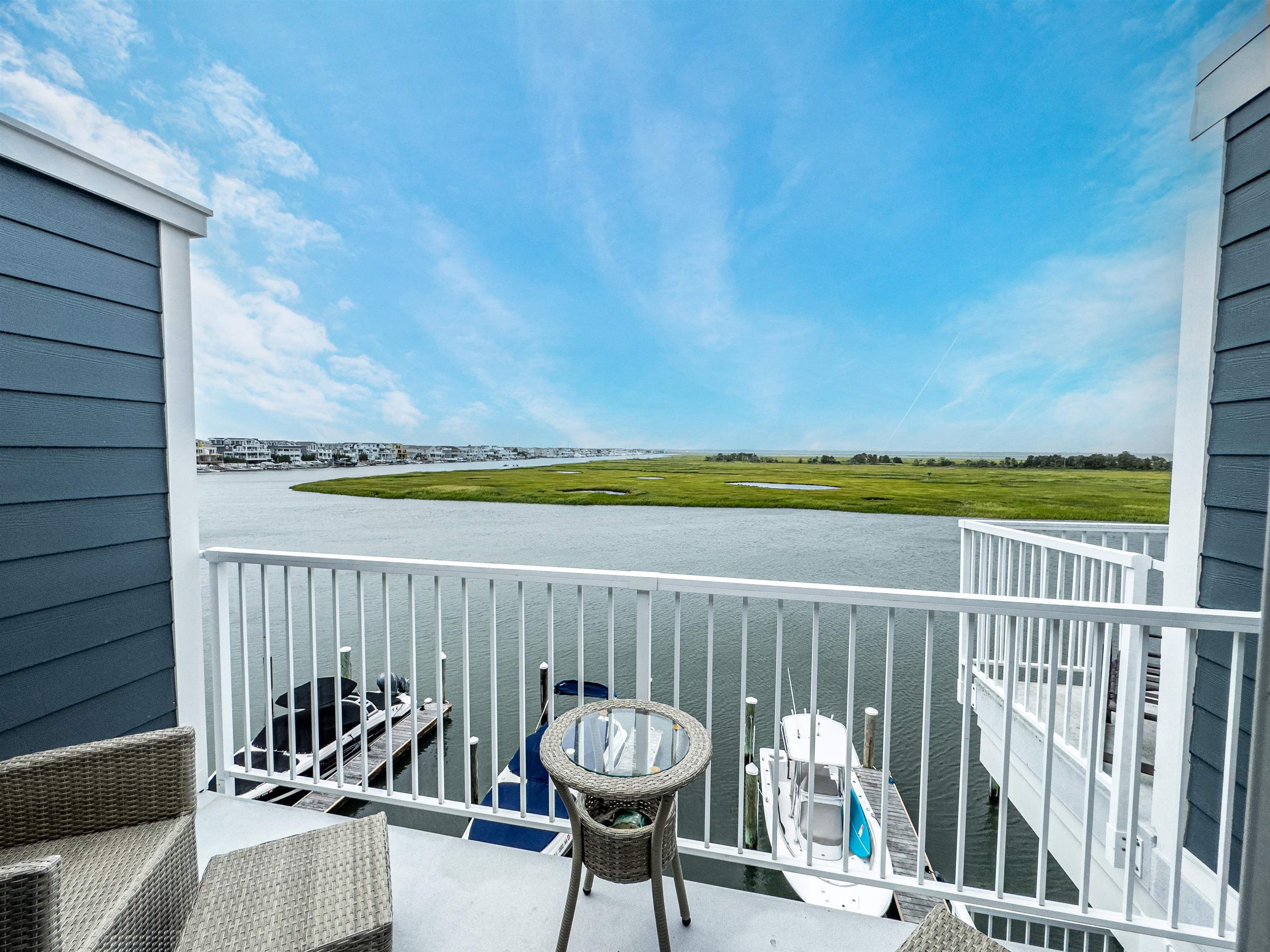 1708 Ocean Drive, Unit 6 Avalon, NJ 08202 - Photo 13 of 18 a view of a chairs and tables on the terrace