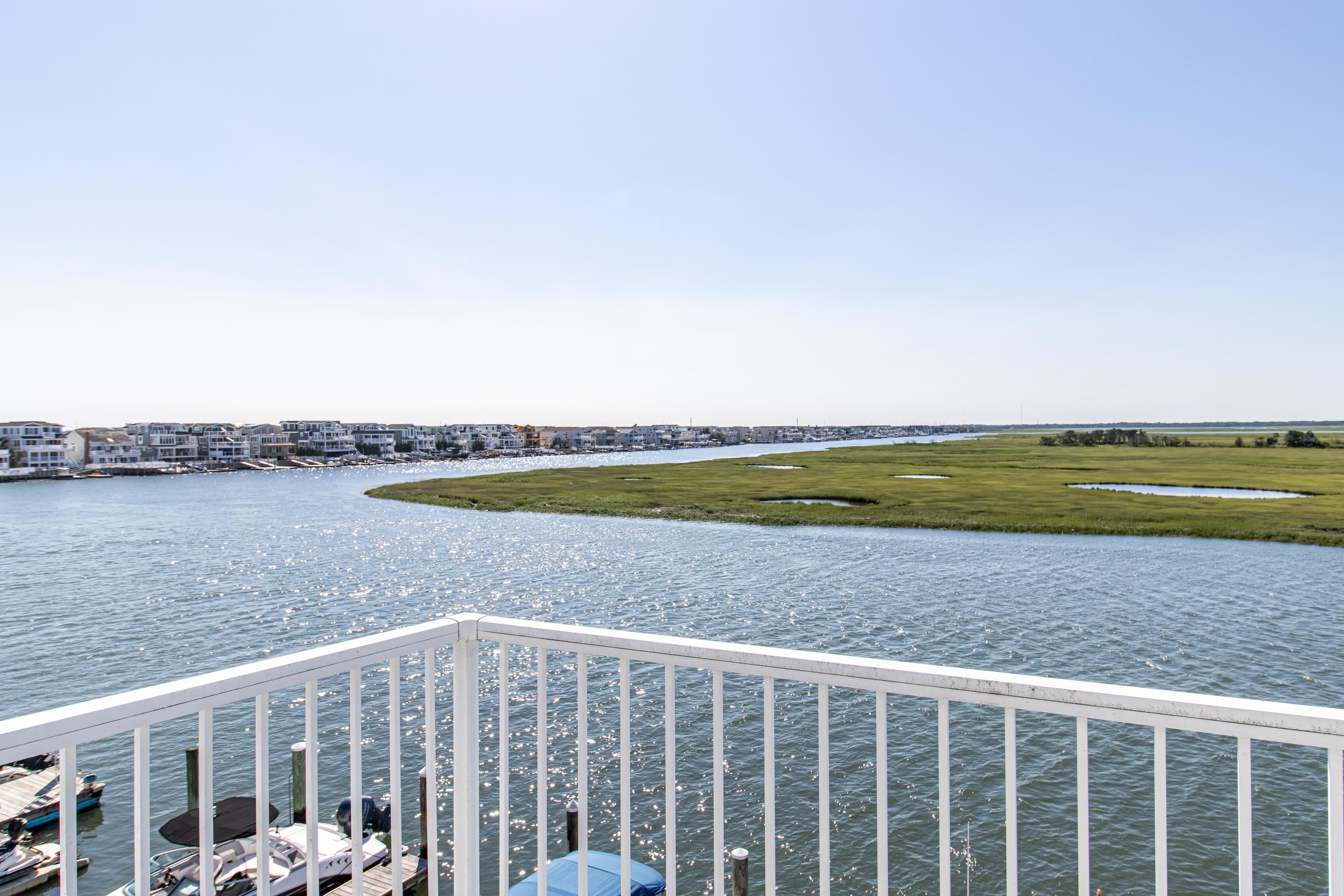 1708 Ocean Drive, Unit 6 Avalon, NJ 08202 - Photo 14 of 18 a view of ocean with a yard