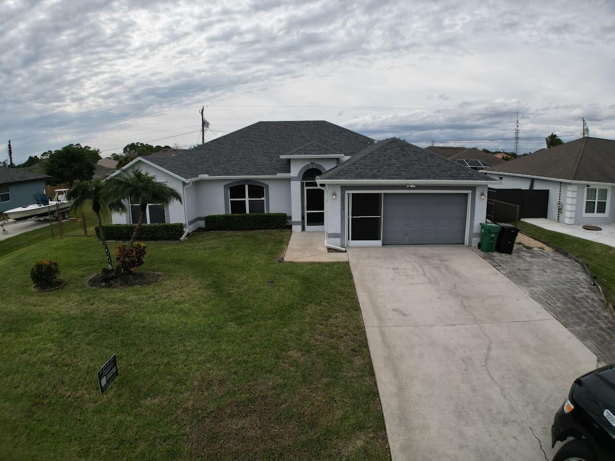 1772 Southwest Bonanza Street Port St. Lucie, FL 34953 - Photo 1 of 34 Front