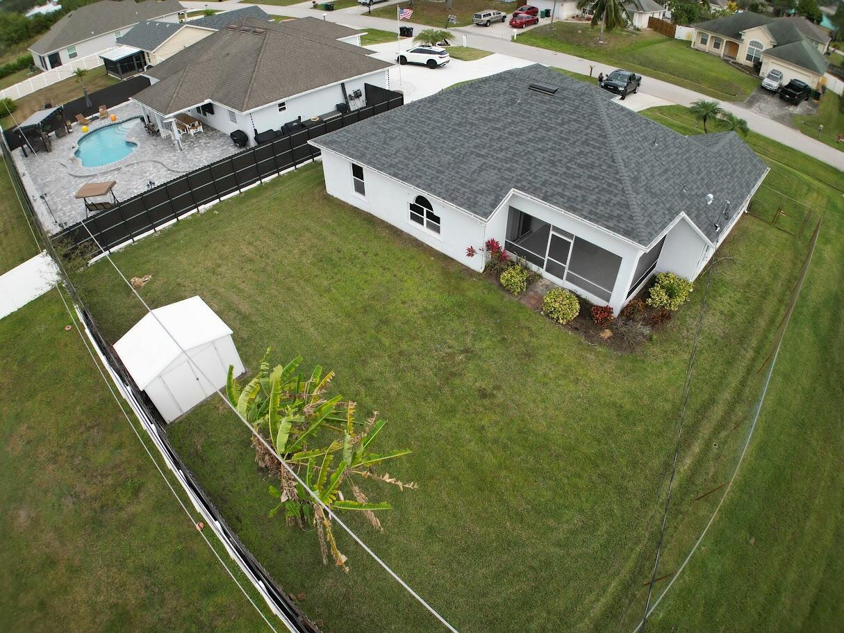 1772 Southwest Bonanza Street Port St. Lucie, FL 34953 - Photo 5 of 34 dji_fly_20260118_134934_33_1768765766085