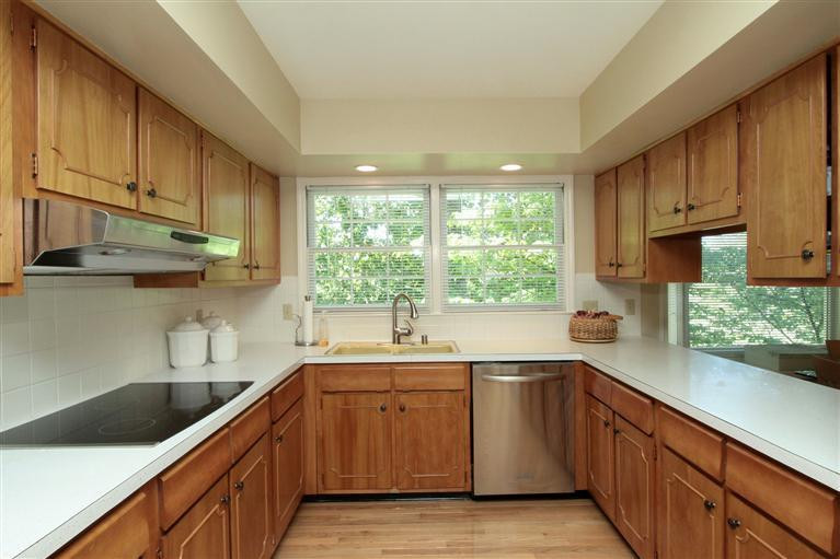 The kitchen has updated stainless steel