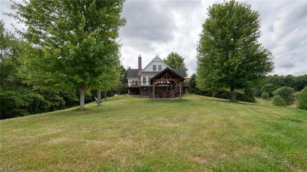 66333 Read Road Cambridge, OH 43725 - Photo 12 of 49 View of yard with a deck