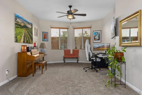 a living room with furniture and a window