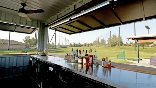 a view of a swimming pool with a ocean view