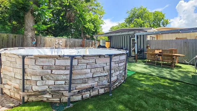 a view of a backyard with a garden