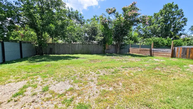 a swimming pool with wooden fence