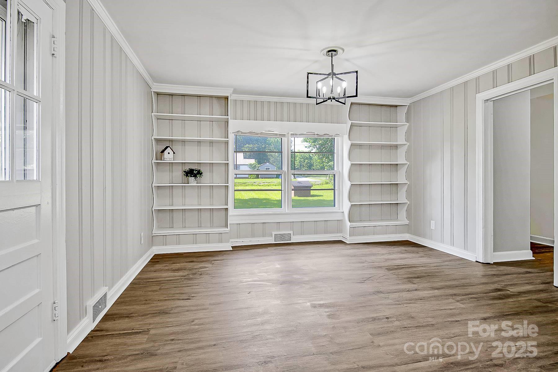 1435 West Ridge Road Salisbury, NC 28147 - Photo 13 of 48 a view of wooden floor and windows in a room