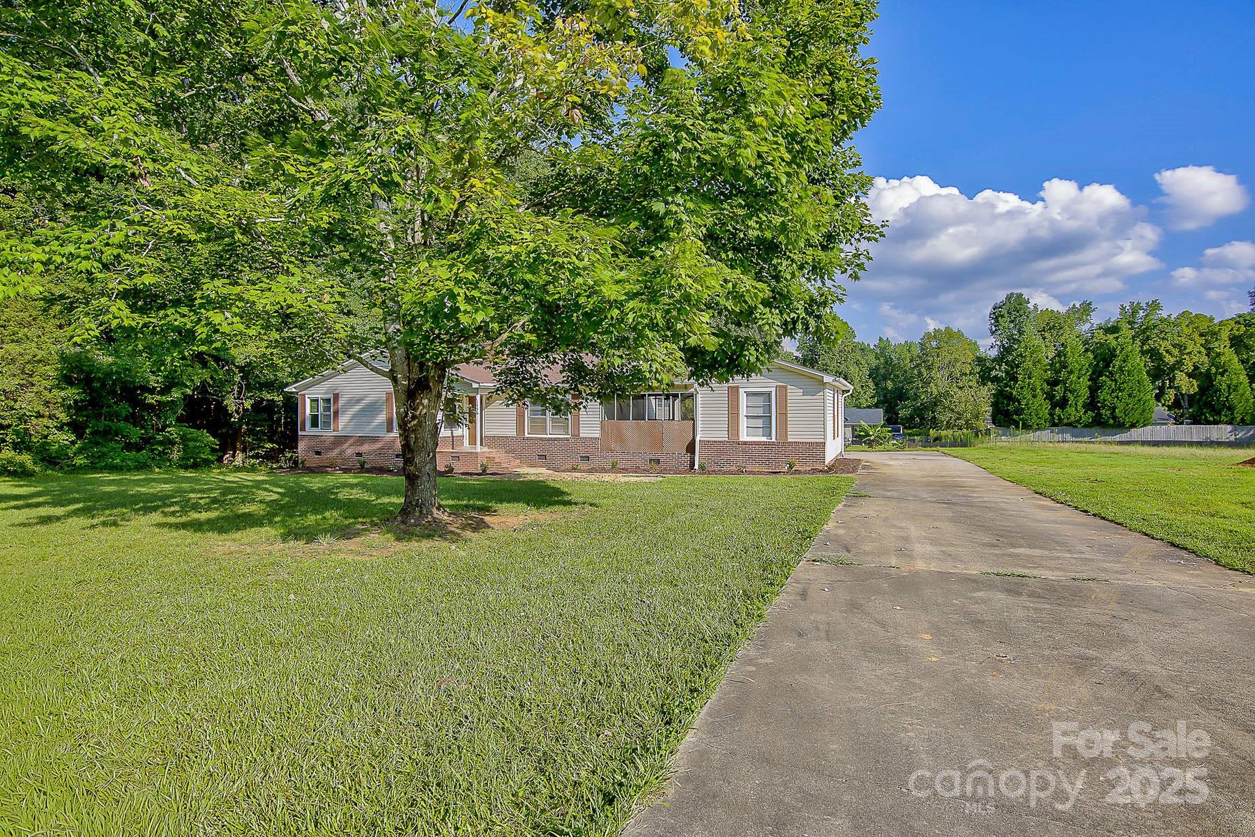1435 West Ridge Road Salisbury, NC 28147 - Photo 3 of 48 a front view of a house with yard and green space