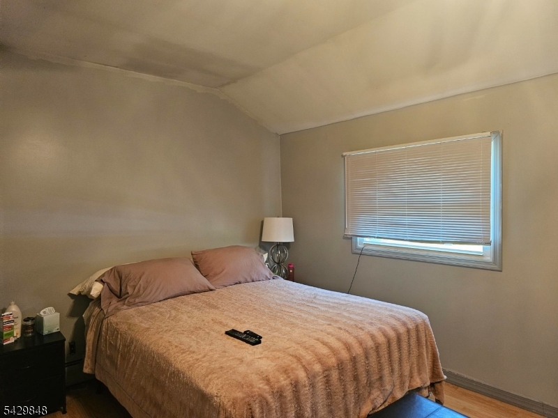 13 Ardena Road West Milford, NJ 07421 - Photo 10 of 14 a bedroom with a bed and a window