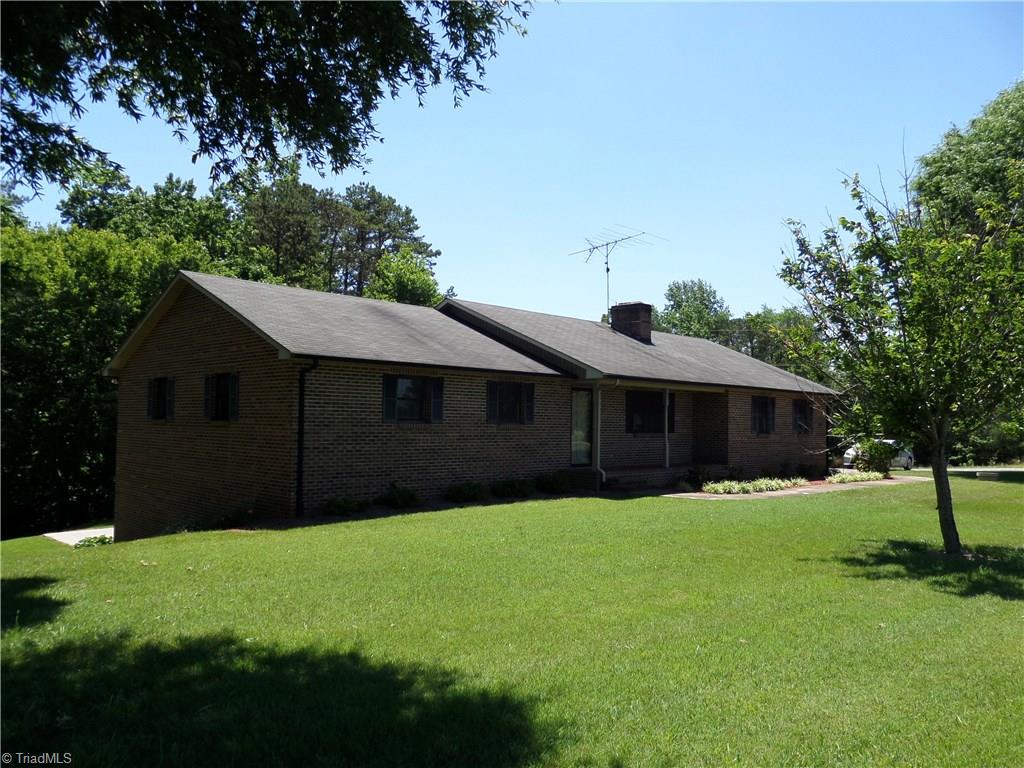 3308 Doub Road East Bend, NC 27018 - Photo 1 of 27 Lovely one level all brick one owner home nestled on approx. 5.44 acres.