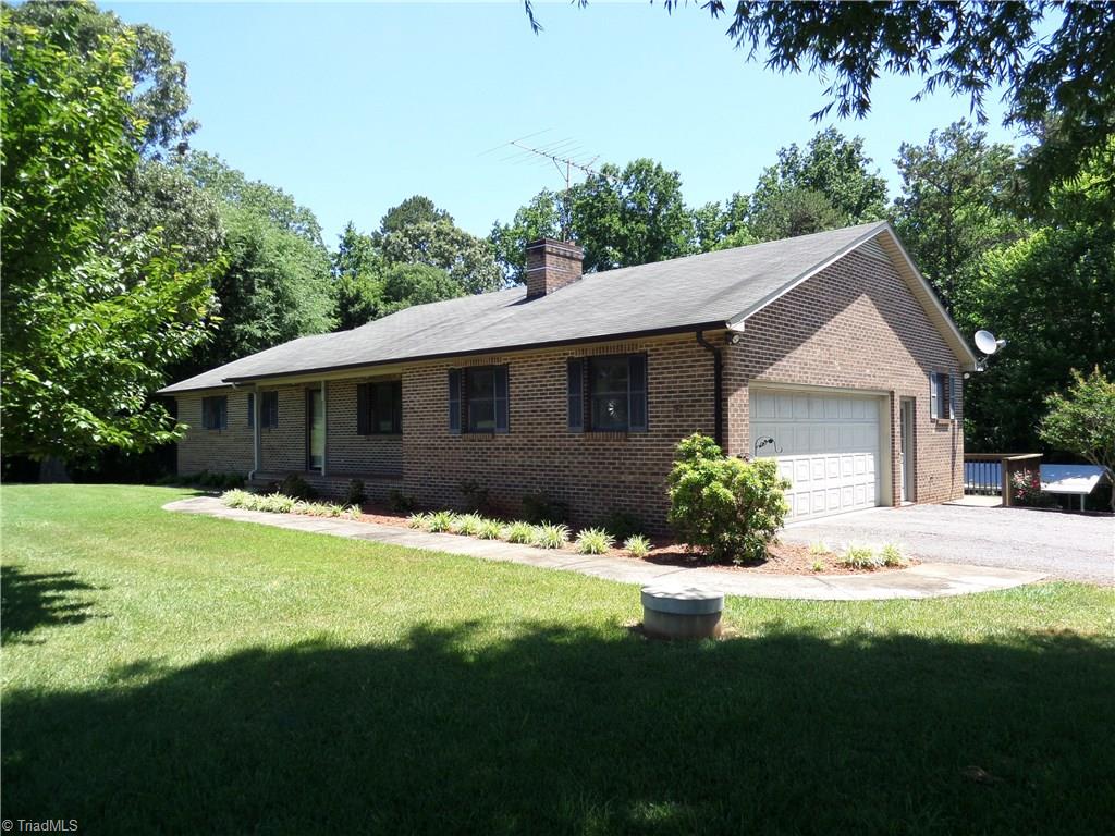 3308 Doub Road East Bend, NC 27018 - Photo 2 of 27 Two car main level garage and walkway to the front door.