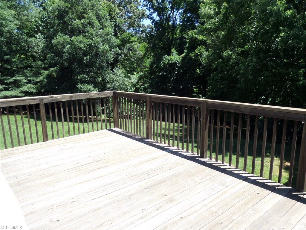 3308 Doub Road East Bend, NC 27018 - Photo 26 of 27 Spacious deck off of the breakfast room overlooking the property.