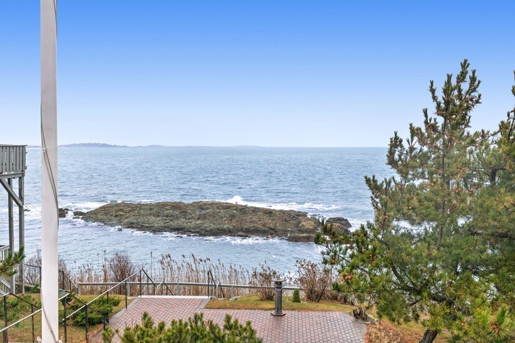 13 Oceanside Drive, Unit 13 Hull, MA 02045 - Photo 20 of 27 a view of an ocean and beach