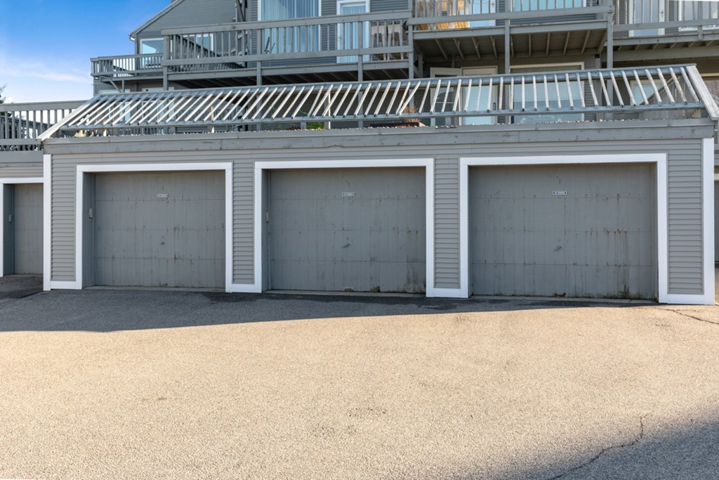 13 Oceanside Drive, Unit 13 Hull, MA 02045 - Photo 23 of 27 front view of a house