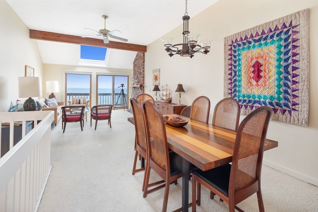 13 Oceanside Drive, Unit 13 Hull, MA 02045 - Photo 6 of 27 a view of a dining room with furniture