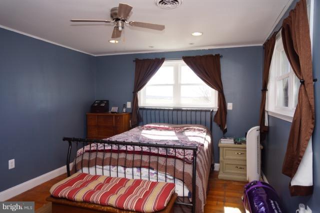 11019 Keymar Road Woodsboro, MD 21798 - Photo 12 of 30 a bedroom with furniture and a window