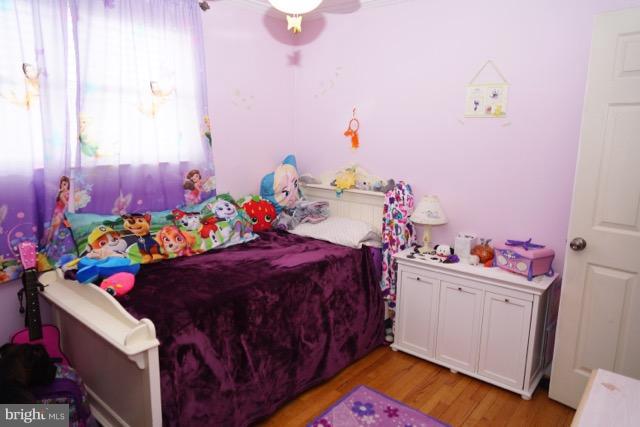 11019 Keymar Road Woodsboro, MD 21798 - Photo 15 of 30 a bed room with a bed and a baby crib