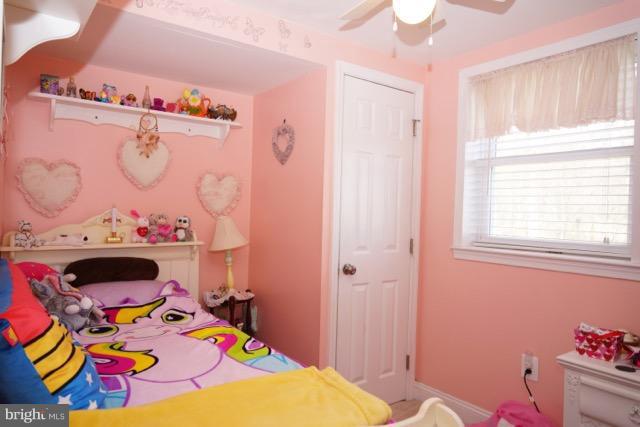 11019 Keymar Road Woodsboro, MD 21798 - Photo 17 of 30 a bed room with a bed and a window