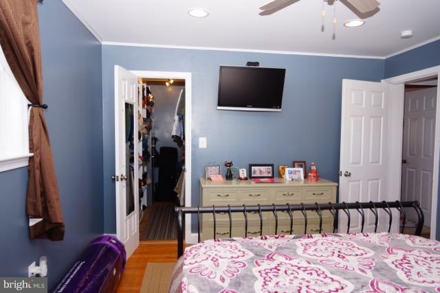11019 Keymar Road Woodsboro, MD 21798 - Photo 10 of 30 a bedroom with furniture and a flat screen tv