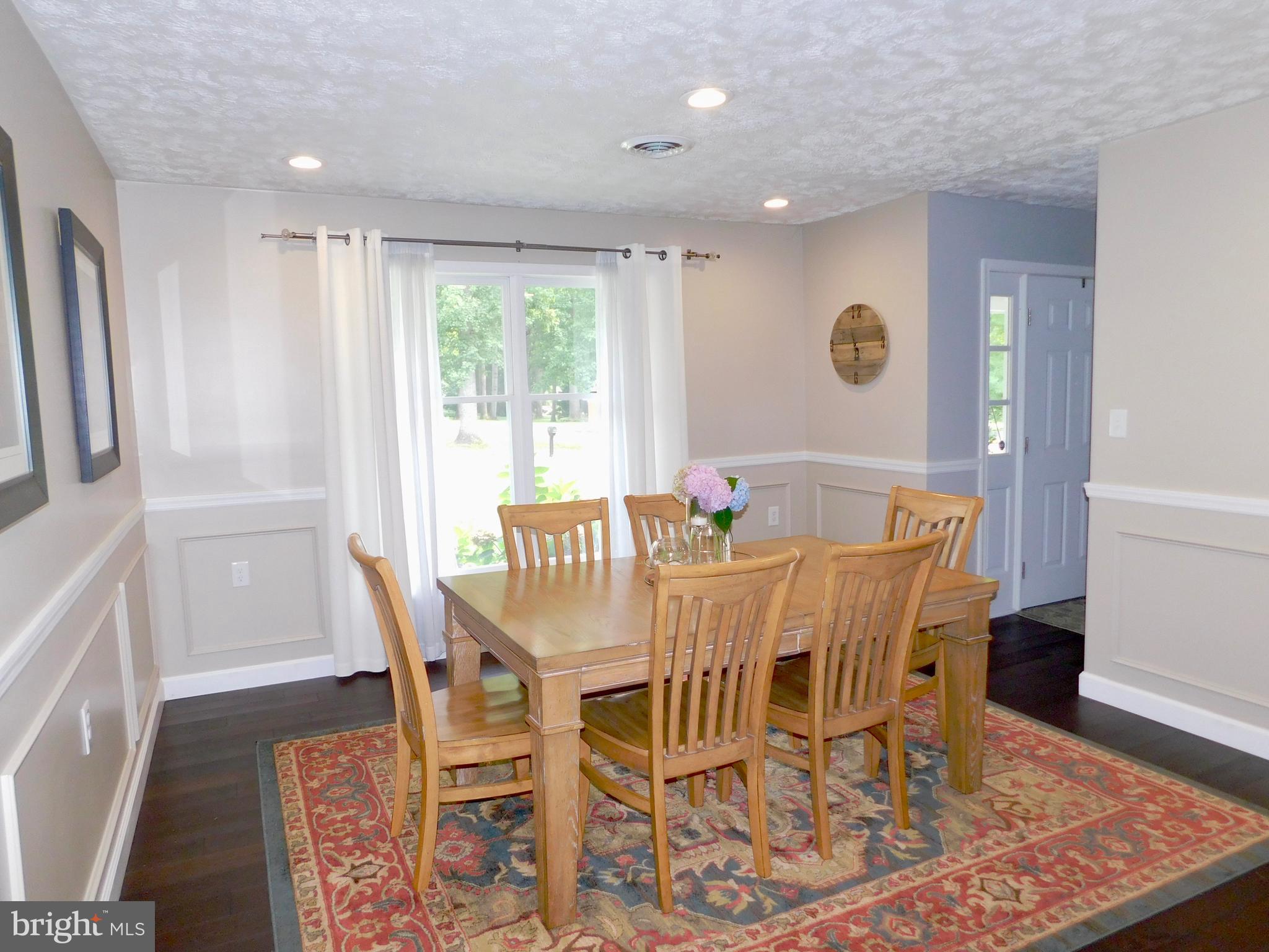 79 Minnick Road Inwood, WV 25428 - Photo 16 of 37 Dining room into foyer