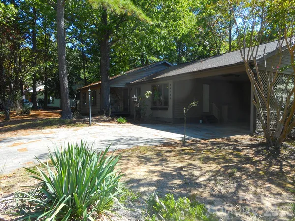 a house with trees in front of it