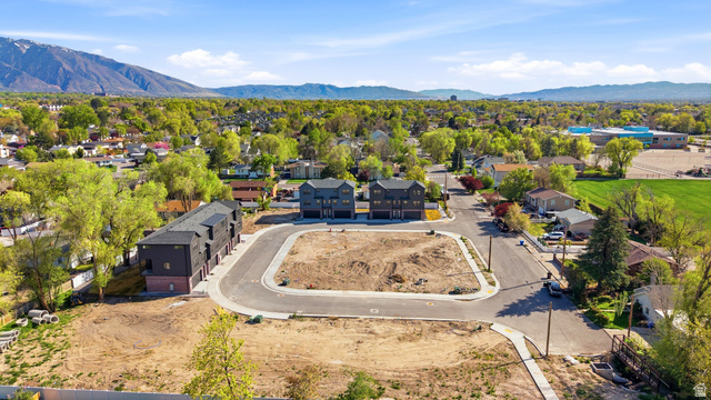 330 East 7635 S Street Sandy, UT 84047 - Photo 26 of 29 Aerial view of residential area featuring a mountain backdrop