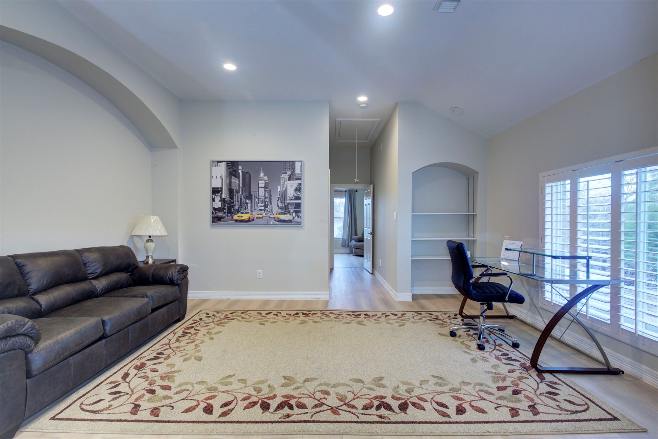 1711 Huldy Street, Unit A Houston, TX 77019 - Photo 36 of 38 a living room with furniture and a rug