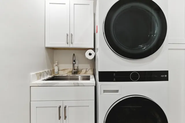 a utility room with dryer and washer
