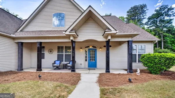 front view of a house with a patio