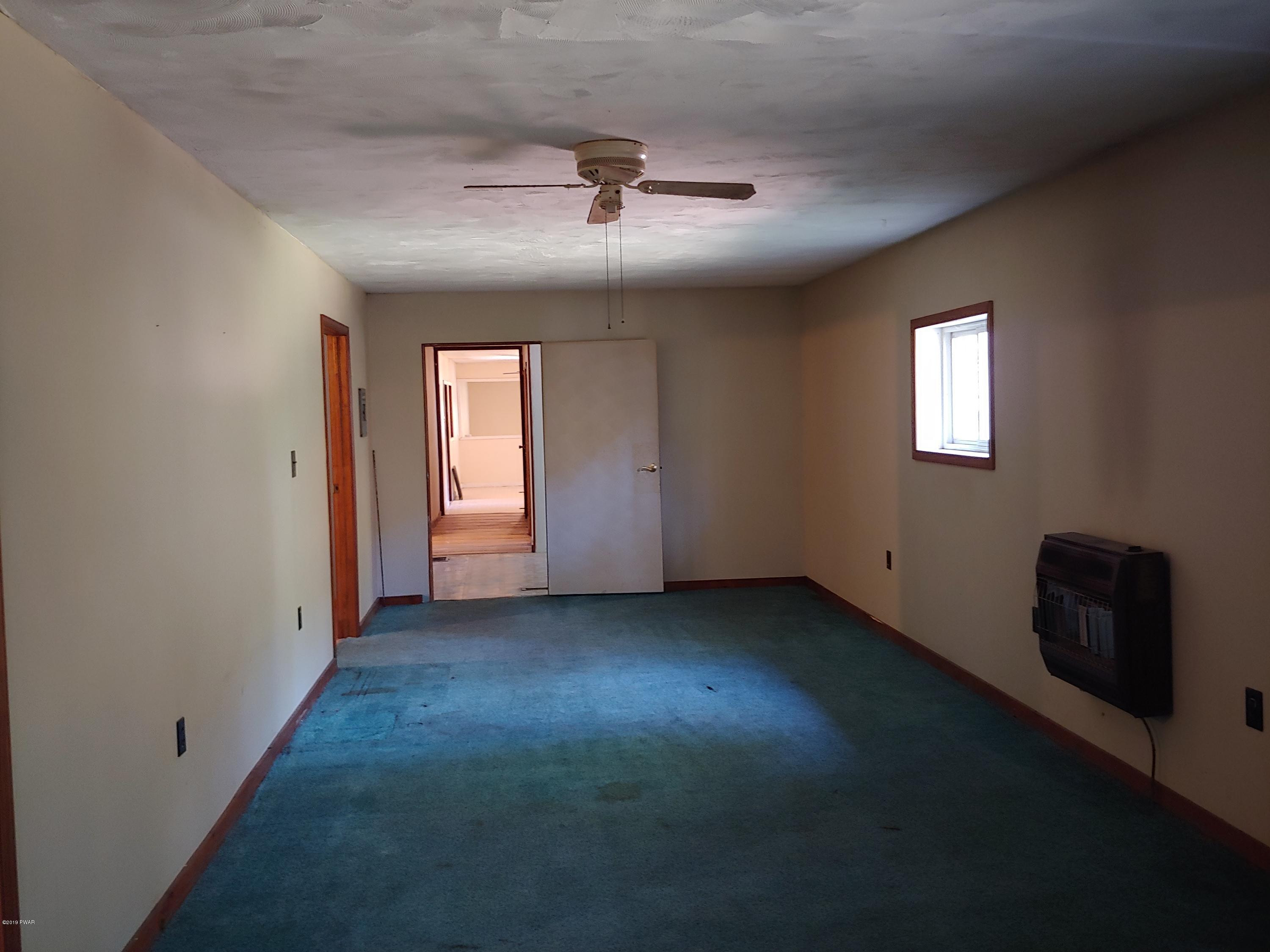 115 Johnson Road Canadensis, PA 18325 - Photo 9 of 28 Family room 1