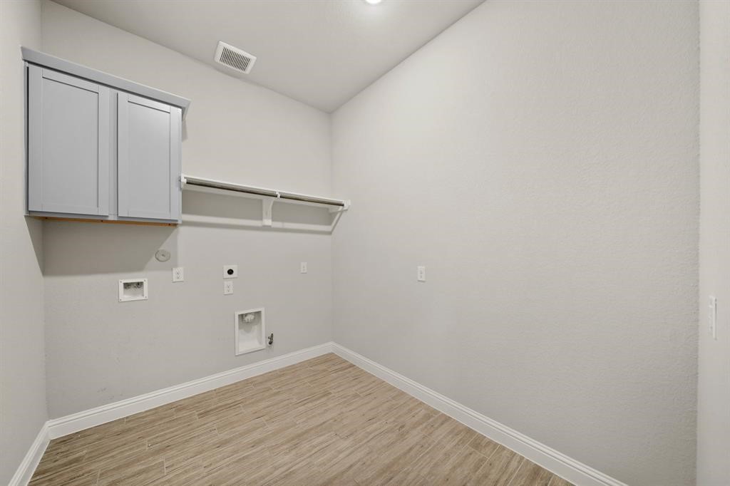 31302 Quartet Court Fulshear, TX 77441 - Photo 31 of 32 a view of small space with wooden floor