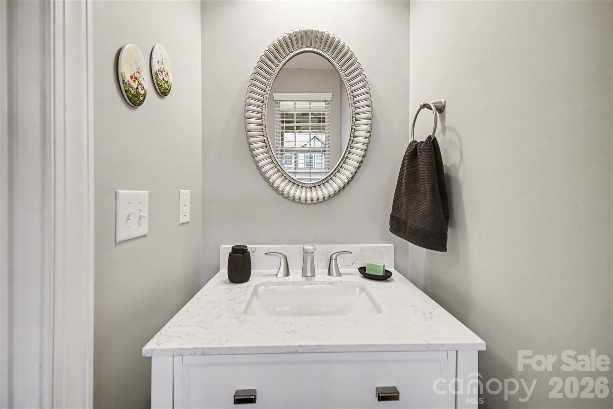1008 Archibald Avenue Fort Mill, SC 29708 - Photo 27 of 43 a bathroom with a sink and a mirror